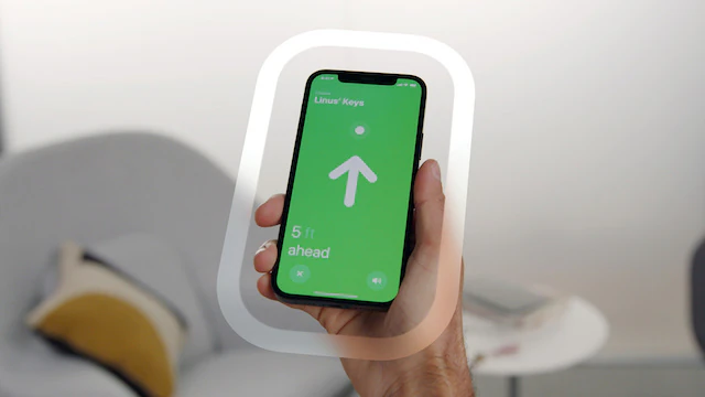 An iPhone showing a directional arrow from the Nearby Interaction API