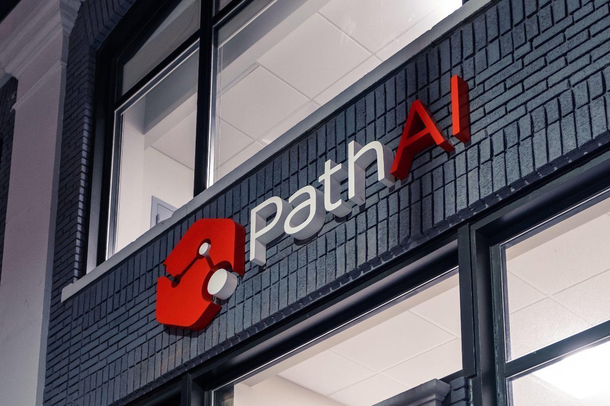 PathAI's sign mounted on the brick exterior of its office